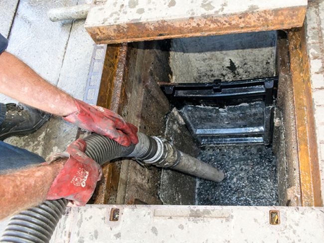 Limpeza profissional de caixa de gordura